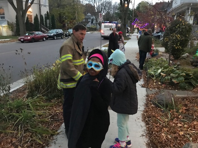 Firefighter Kearney with trick-or-treaters