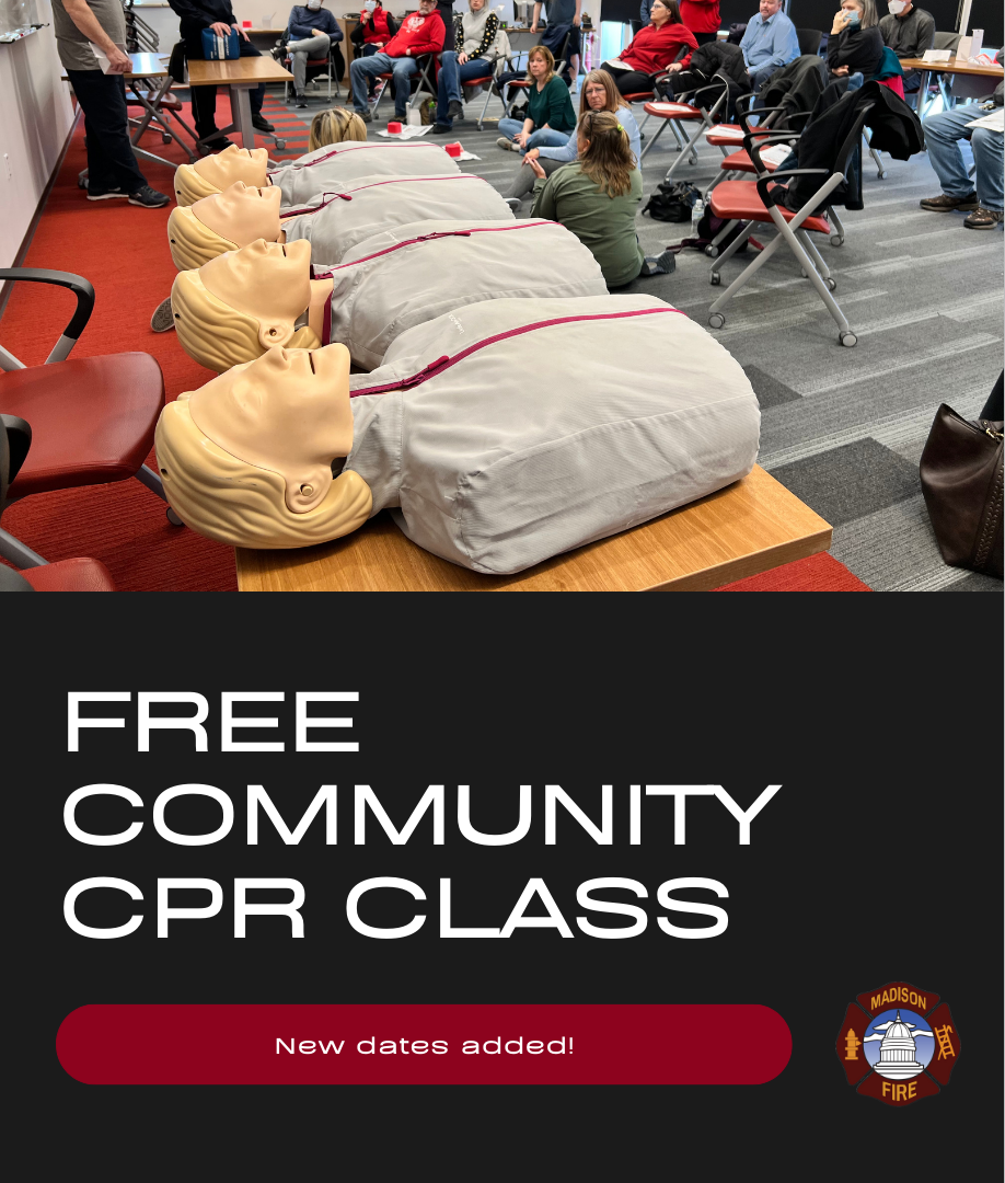 mannequins lined up on a table for CPR training