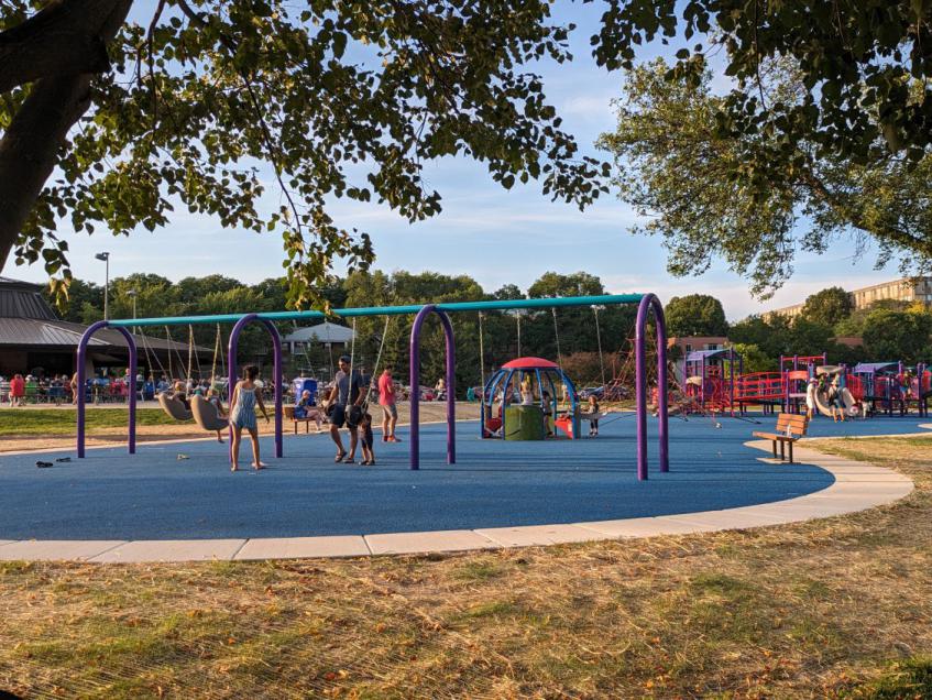 a photograph of the recently completed inclusive playground at Rennebohm Park in the evening on Thursday, August 3rd 2023