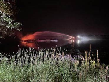 View of Lake Rescue 1 attacking the boat fire, as seen from shore