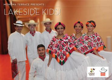 4 men and 3 women in traditional Mexican dancewear
