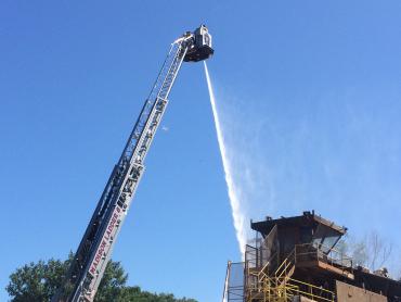 Aerial Ladder 8 bucket and fire attack