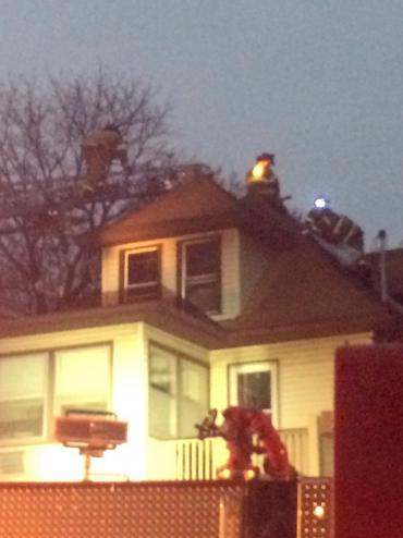 Firefighters on the roof