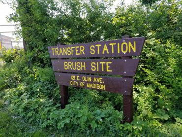 The sign for the transfer station at 121 E. Olin Ave where residents can get limited amounts of mulch for free starting June 5.