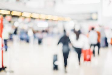 blurry airport baggage claim