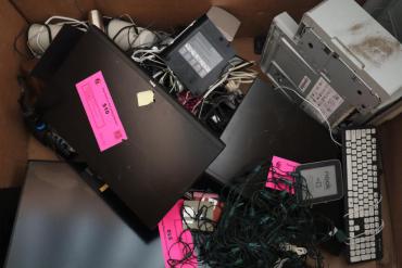 Here is a pile of electronics.  They have pink stickers on some of these - and you won't need those stickers  starting February 20, 2023