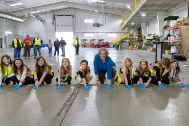 Mayor and Girl Scouts Put Handprints in Low-Carbon Concrete