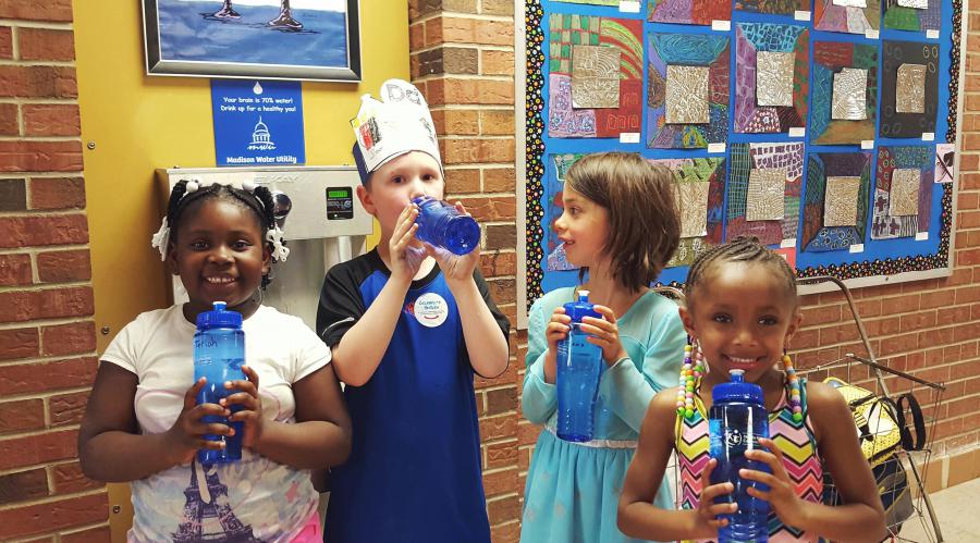 Students fill bottles at Lindbergh Elementary hydration station