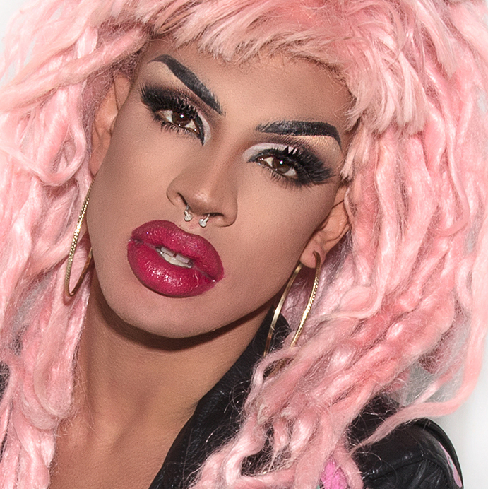 Yvie Oddly A light-skinned, pink haired femme