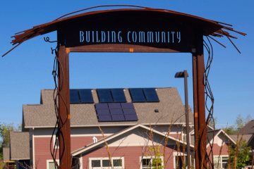 Community sign in front of facility