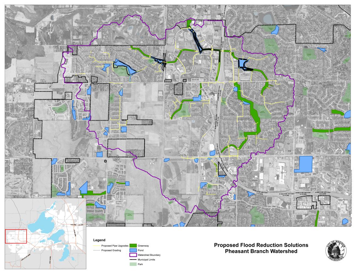 This map shows the outline of the Pheasant Branch Watershed Study with the ponds in blue, greenways in green, and parks in light green.  The background for the map is a black and white aerial photograph.  The proposed solutions are shown in black lines to show the shape and yellow lines for the proposed storm sewer.