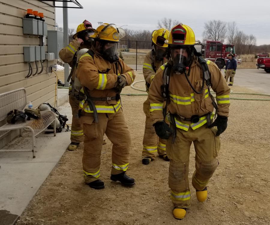 Healthcare providers in firefighter turnout gear