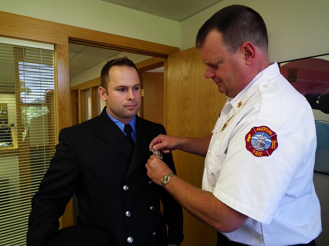 Chief Davis pins the badge