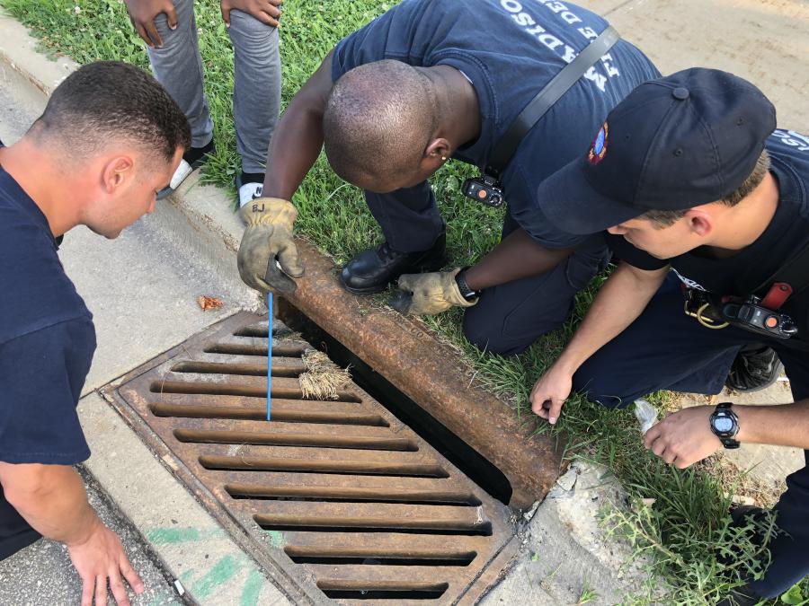 E10 retrieving cell phone from sewer