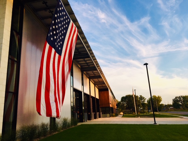 American flag hanging off Fire Station 14