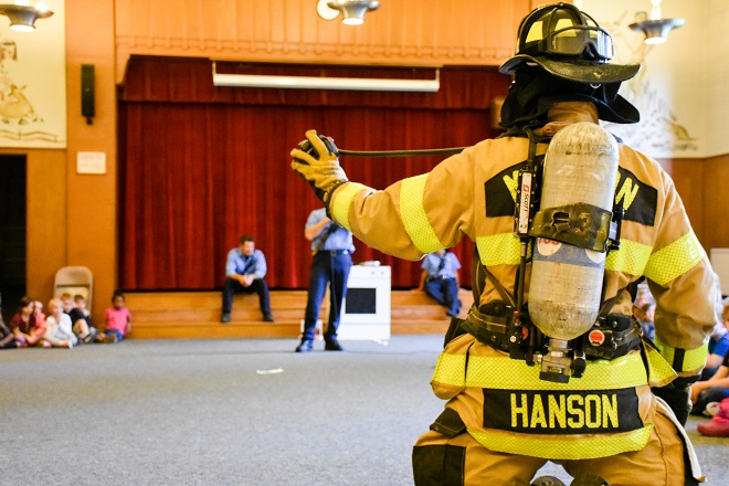 Firefighter Hanson in full gear