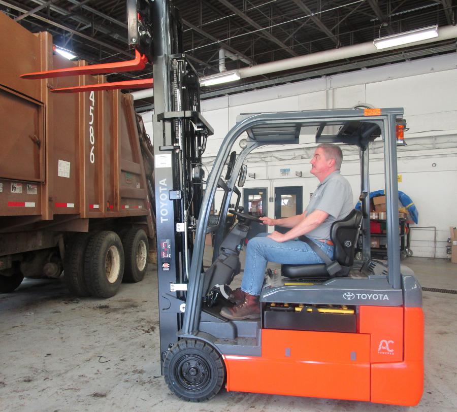 Mark Vander Waal operating an electric forklift