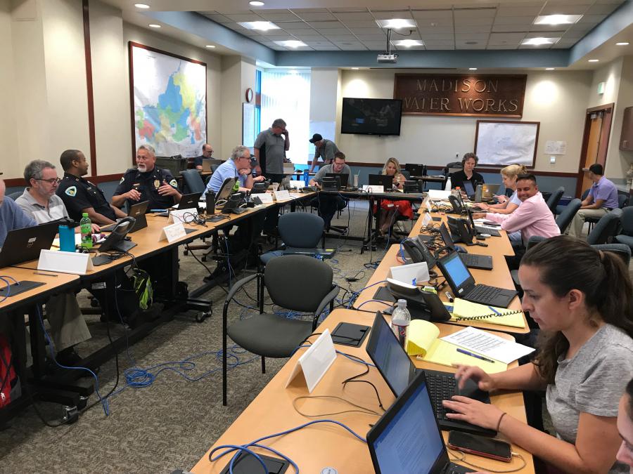 City and county staff work together at the Emergency Operations Center.