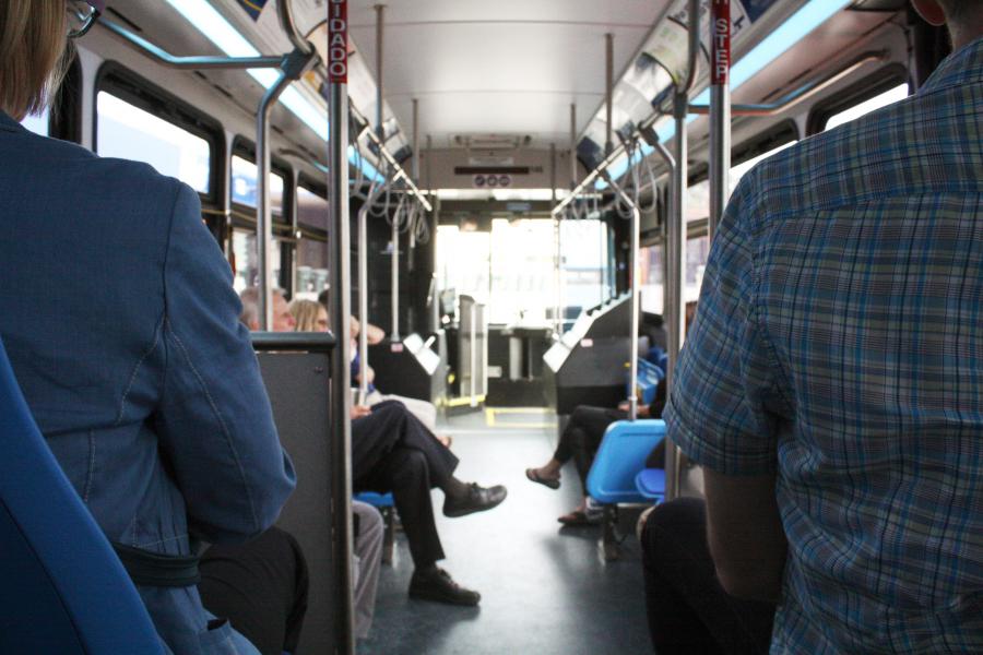 People riding the bus.