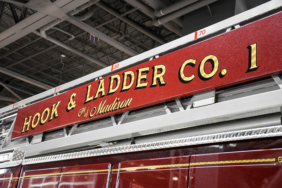 Hook & Ladder Co. 1 displayed on aerial ladder