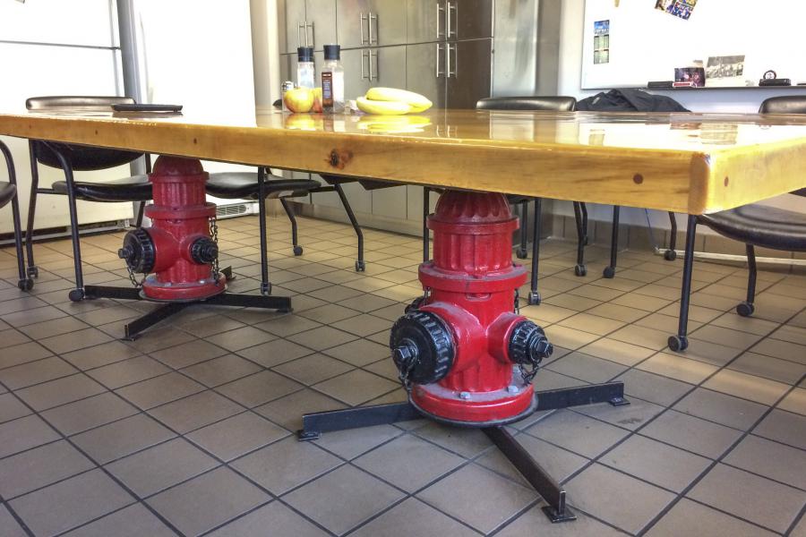 Kitchen Table - Repurposed fire hydrants make up the legs of this handmade, customized kitchen table.