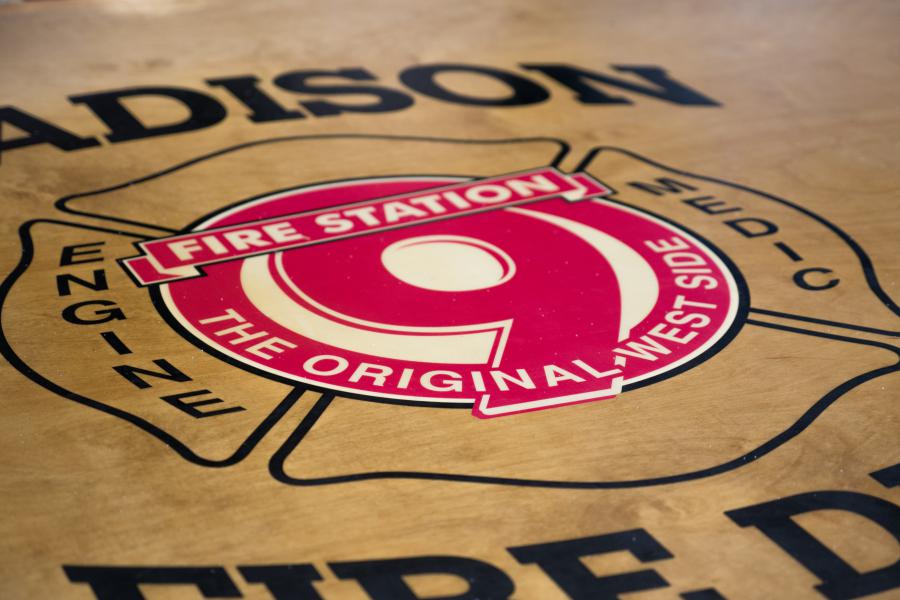 Station 9 Table - Station 9's kitchen table features a custom-made emblem at the center.