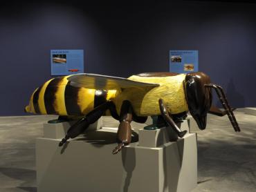 Yellow and brown Honey Bee coffin by Ghanian Fantasy Coffin maker Eric Adjetey Anang