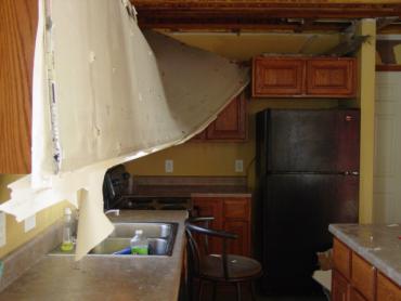 Ceiling collapsed after pipes burst in an upstairs bathroom
