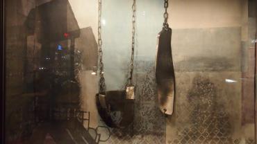 Image of Tyanna Buie's storefront window installation at 341 State Street. Title "This is only a Façade" 