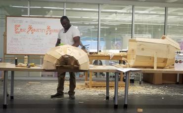 Eric Adjetey Anang working on coffin at MPL's Bubbler makerspace