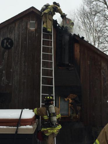 MFD Engine Company 10 extinguishes chimney fire.