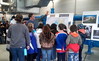 Kids from Crestwood Elementary tour a water well