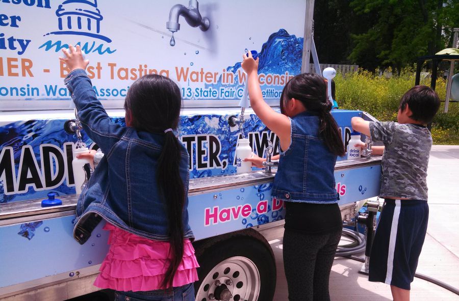 Children get water from the Water Wagon