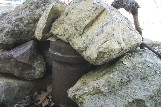 Private well under rocks