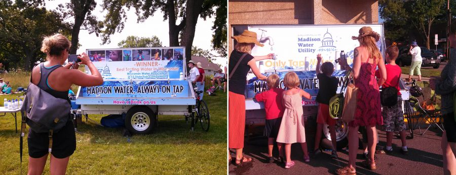 Woman takes photo of Water Wagon and people refill bottles