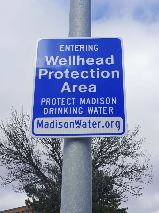 Wellhead protection sign
